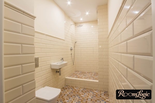 Milk-white subway tile in a bathroom with a shower