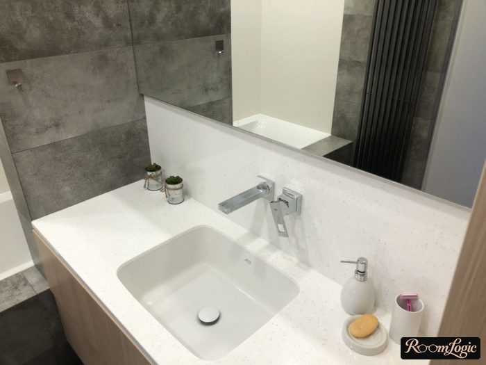 modern built-in faucet in bathroom