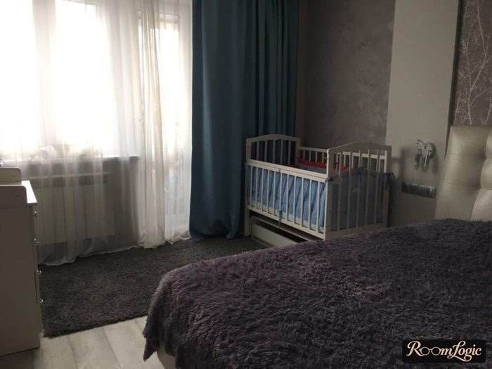 Modern classic style in a bedroom with a crib