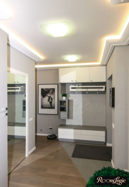 modern closet with attic storage for entryway