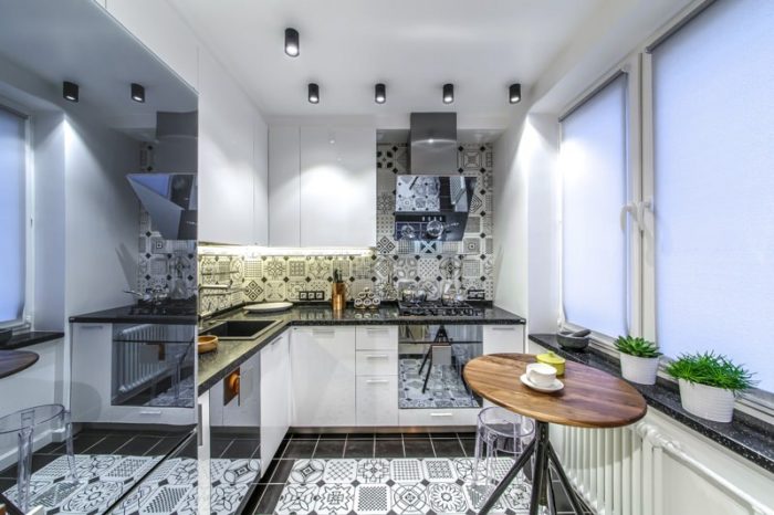 modern corner kitchen in a tiny apartment