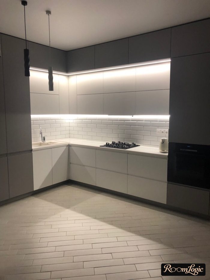 modern gray-white kitchen to the ceiling