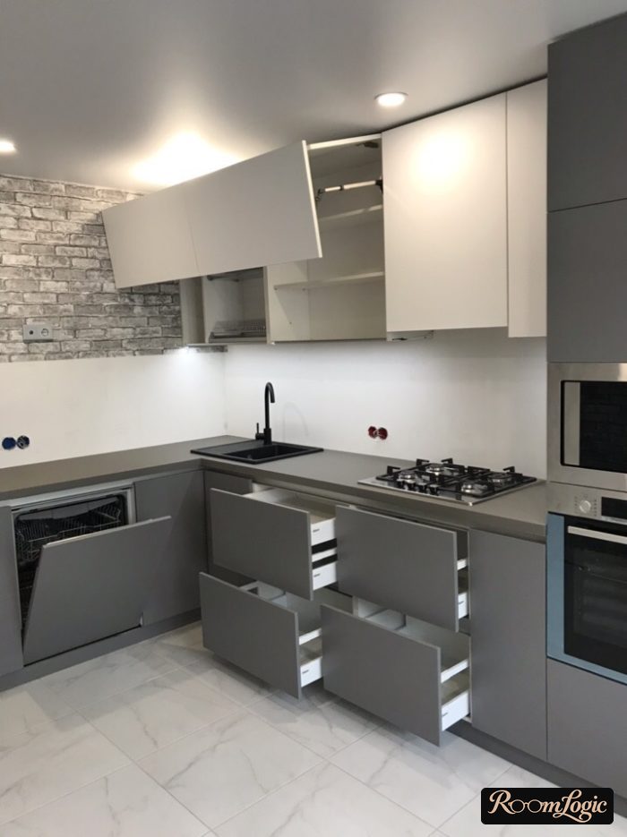 modern hardware in a corner gray kitchen