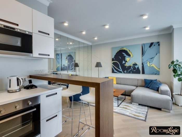modern kitchen design open to living room with bar counter