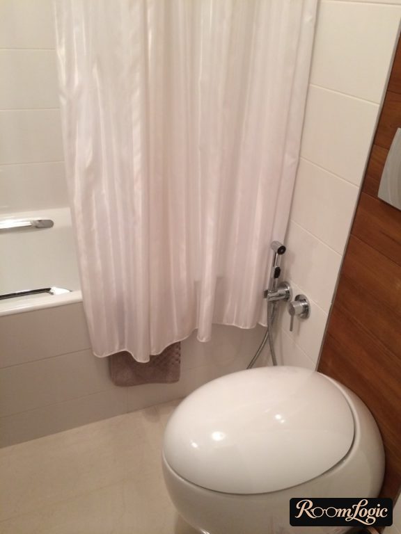 modern suspended toilet in white bathroom