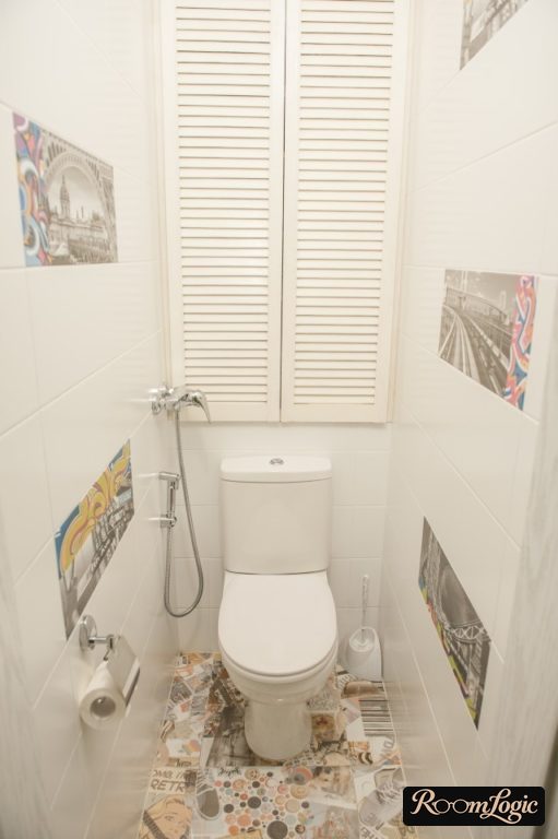 modern toilet with blinds to hide pipes