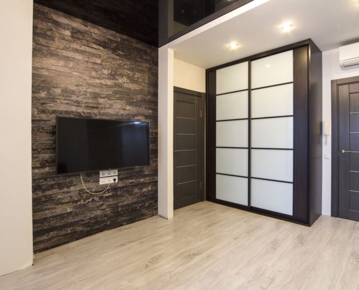 modern wall finish behind the television