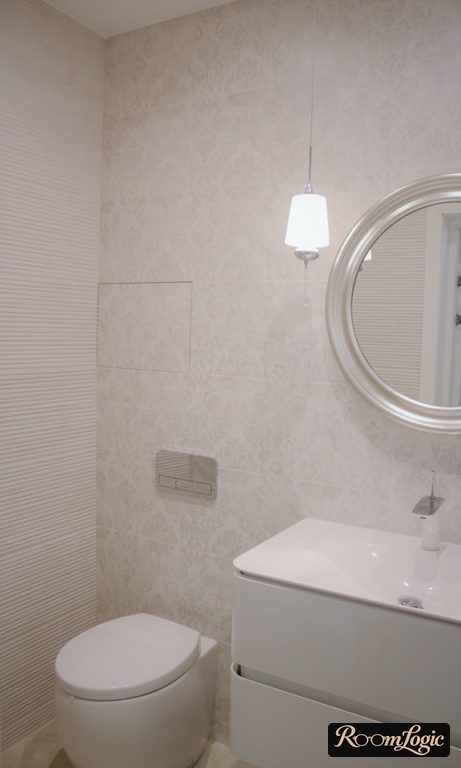modern white faucet in bathroom