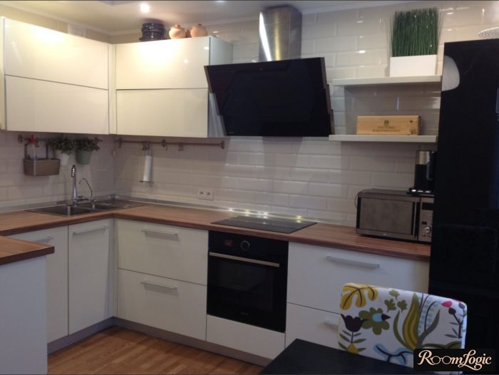 modern white kitchen with shelves on one side and cabinets on the other
