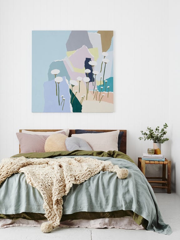 multicolored painting in the bedroom