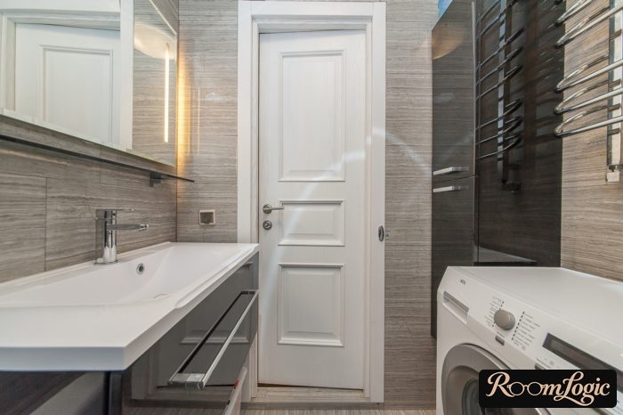 narrow door 70 in bathroom in tiny apartment