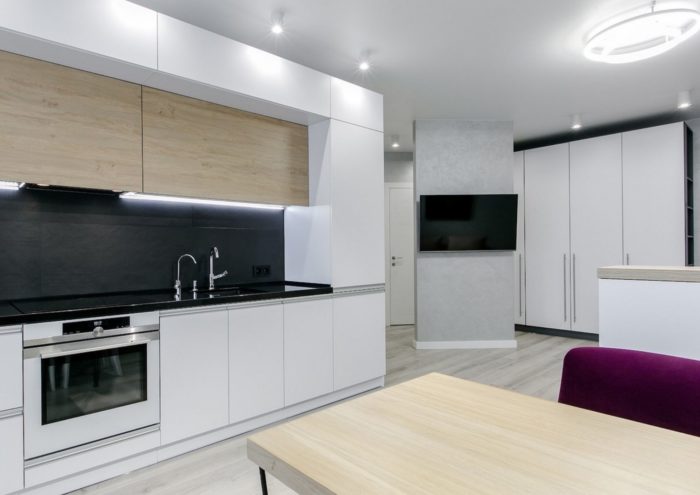 narrow partition with a TV in the studio