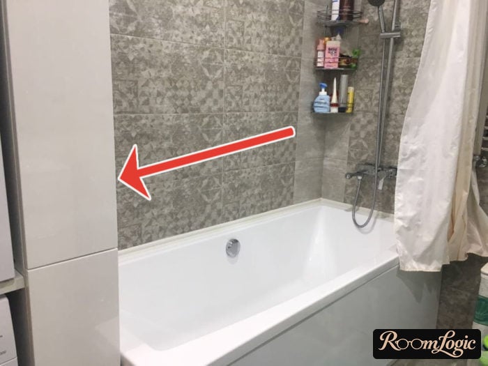 narrow white shelf in the bathroom of a tiny apartment