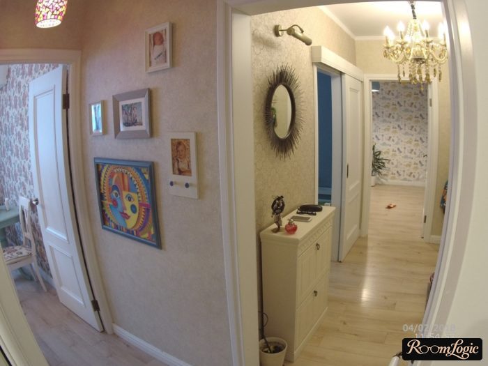 narrow white sideboard in hallway