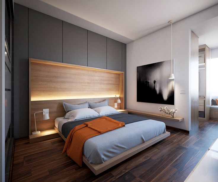 niche with lighting behind bed