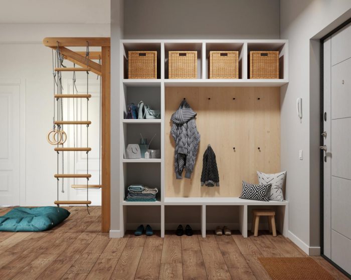 open closet in entryway in scandi style