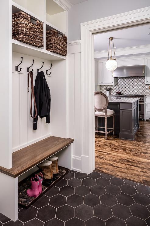 open coat hooks and bench in entryway