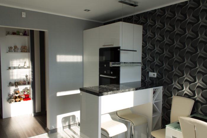 Open corner breakfast bar made of Corian