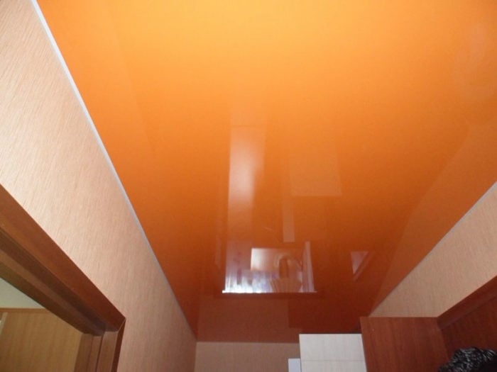 orange stretch ceiling in entryway