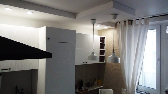 particleboard under white wood on the kitchen