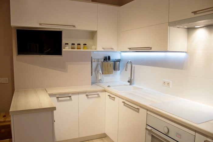 particleboard with wood grain imitation on white kitchen