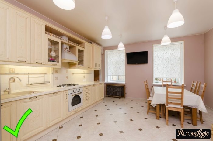 pastel pink wallpaper in a classical kitchen