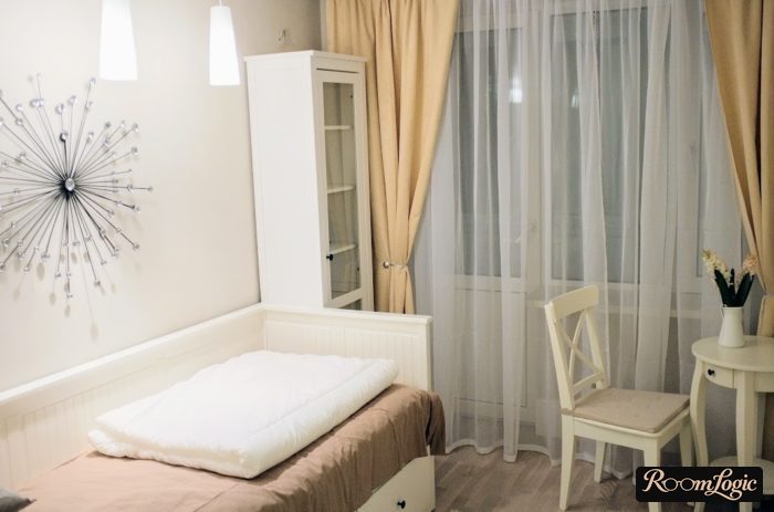 peach curtains in a girl's room in provence style