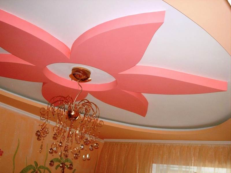 pink flower made of drywall on the ceiling