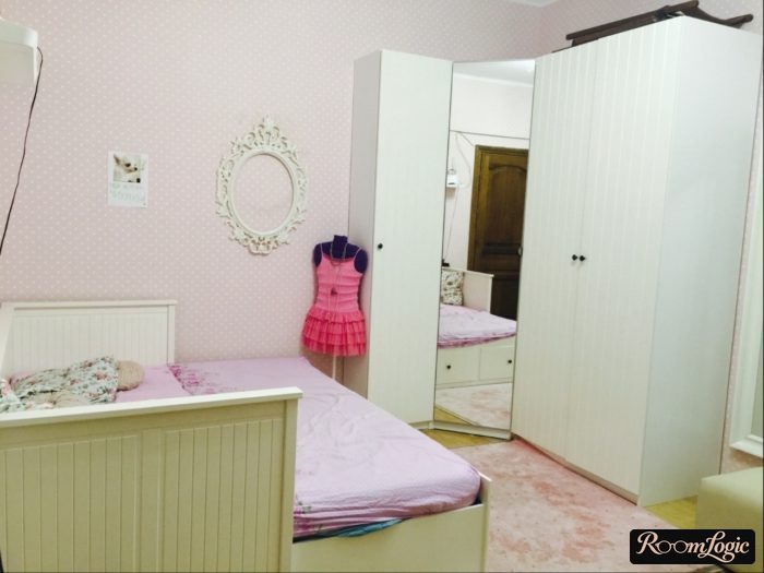 pink wallpaper and white furniture for a teenage girl