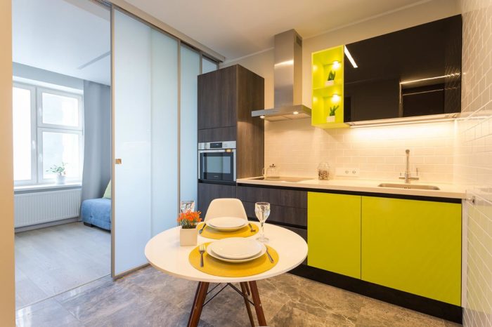 pistachio and black colored small kitchen design
