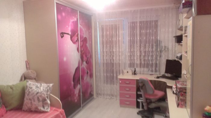 plain furniture in pink kids' room