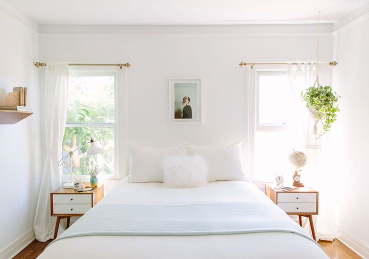 plants in white bedroom