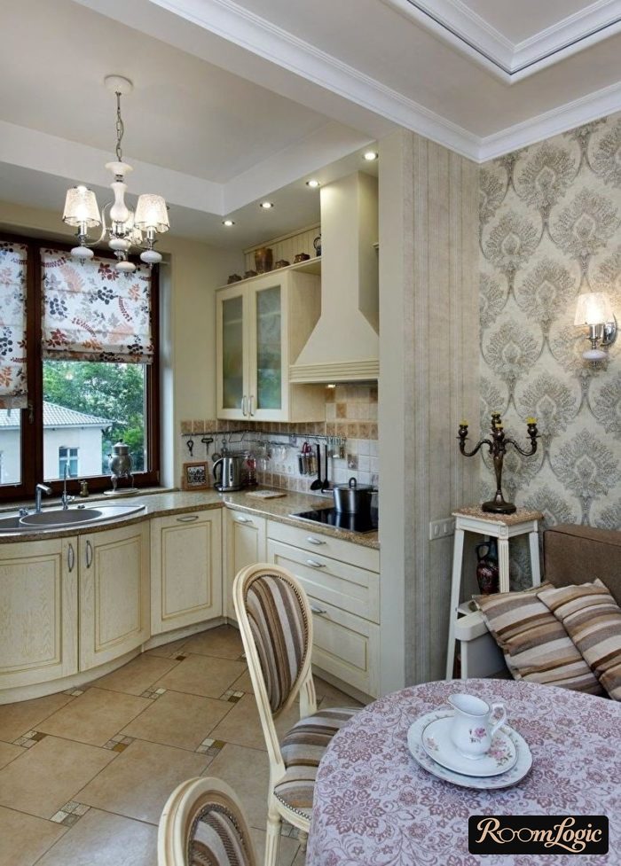 Provence-style wallpaper on the kitchen wall in a private home