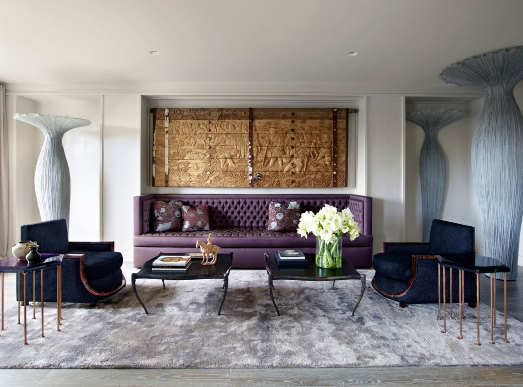 purple button-tufted sofa