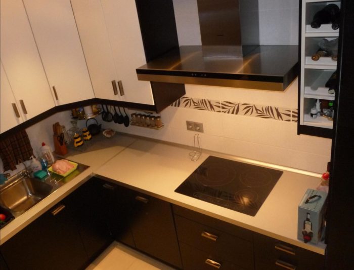rail for spices and knives in tiny apartment