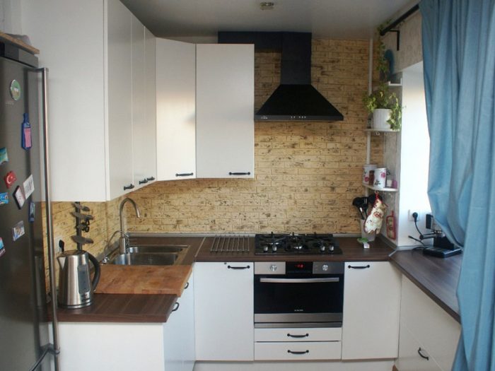 range hood in the kitchen of a tiny apartment
