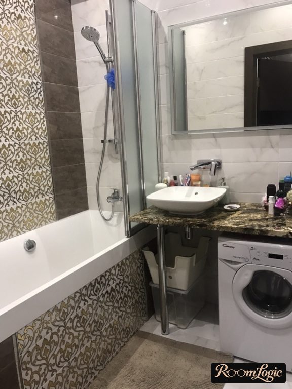 real bathroom with a washer
