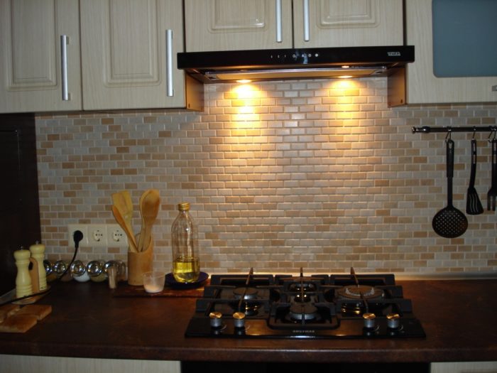 rectangular mosaic on the kitchen backsplash