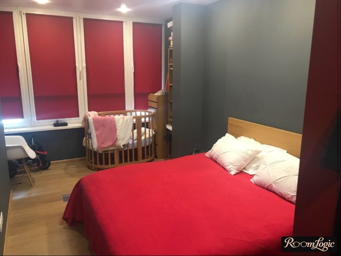 red bedding and curtains in the bedroom