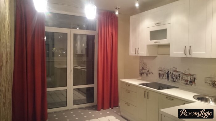 red curtains on the kitchen with a balcony door