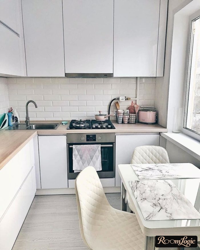 refrigerator on the kitchen counter in a tiny apartment 6