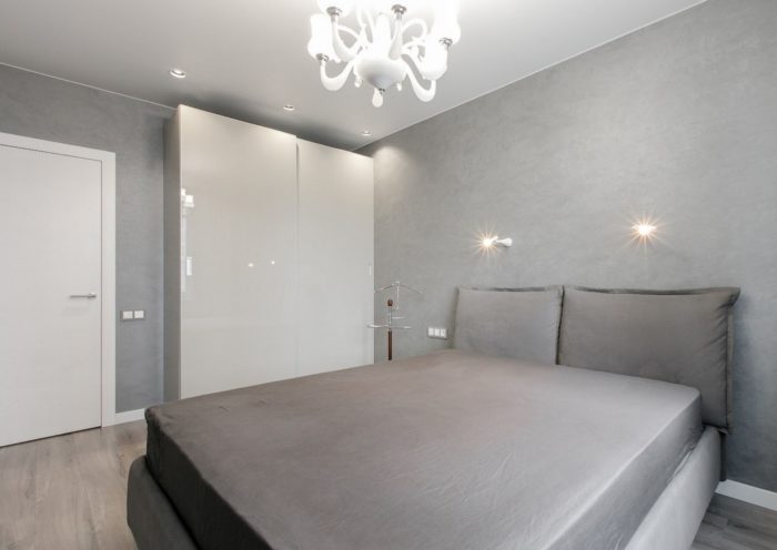 Satin white stretch ceiling in the bedroom