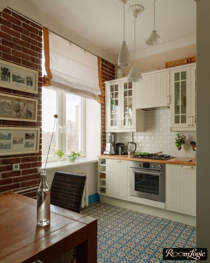 scandinavian-style kitchen with tiled floor with a pattern