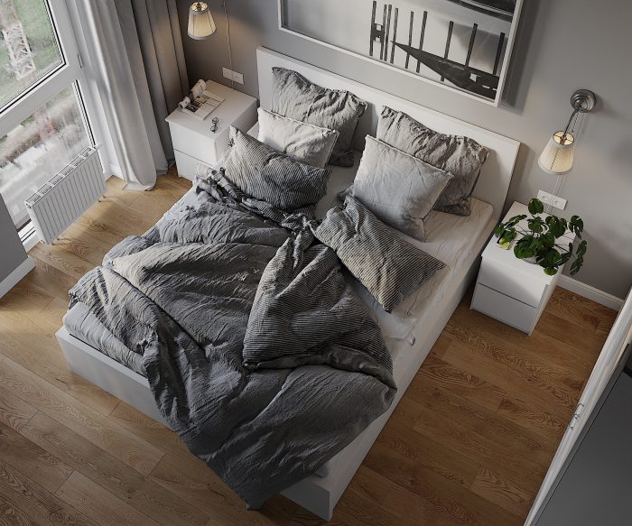 scandinavian styled bedroom with gray bedding