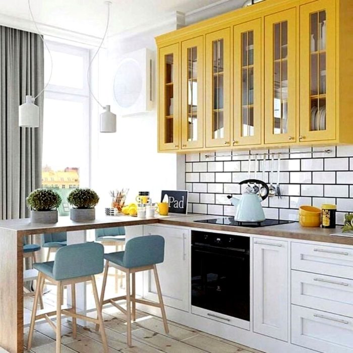 scandinavian styled kitchen with bar counter