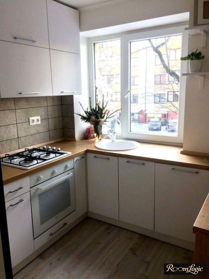 scandinavian styled kitchen with sofa