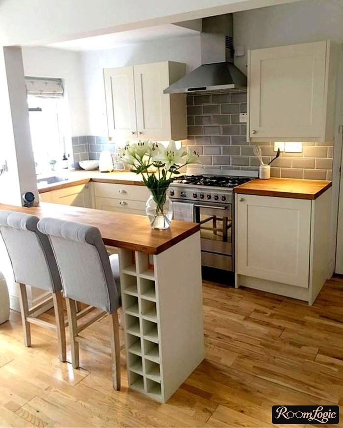 scandinavian white kitchen with wood-look and breakfast bar