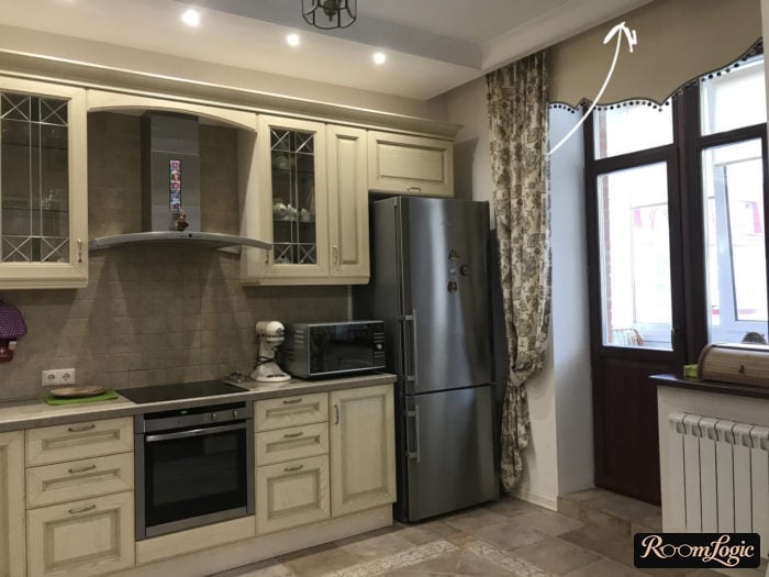 shades on a hidden ceiling curtain rod in a kitchen with a balcony