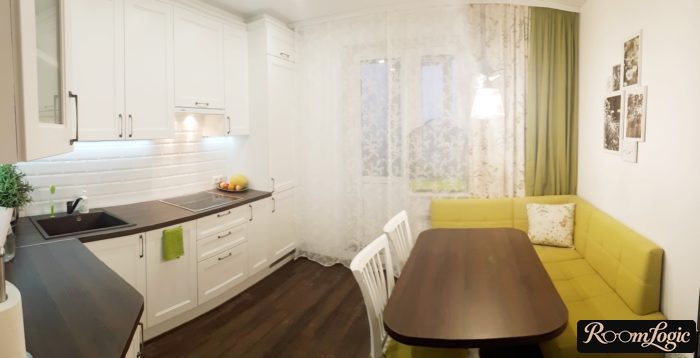 shades on a modern white kitchen with a balcony door