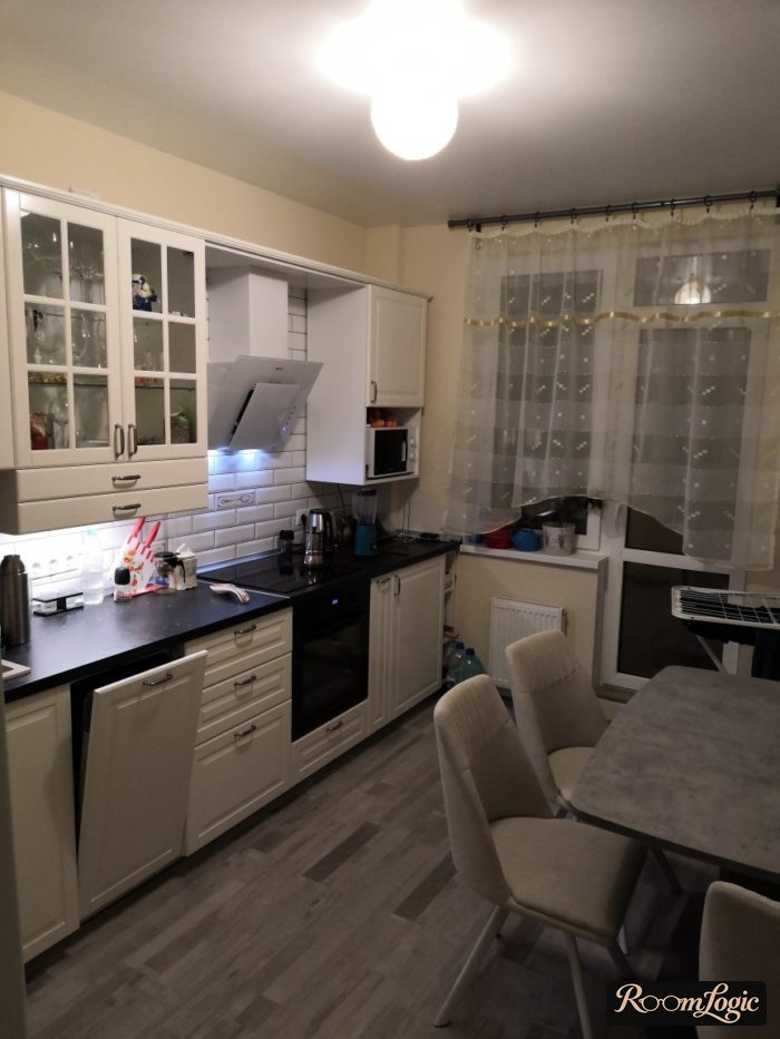 sheer curtain with golden thread on kitchen with balcony